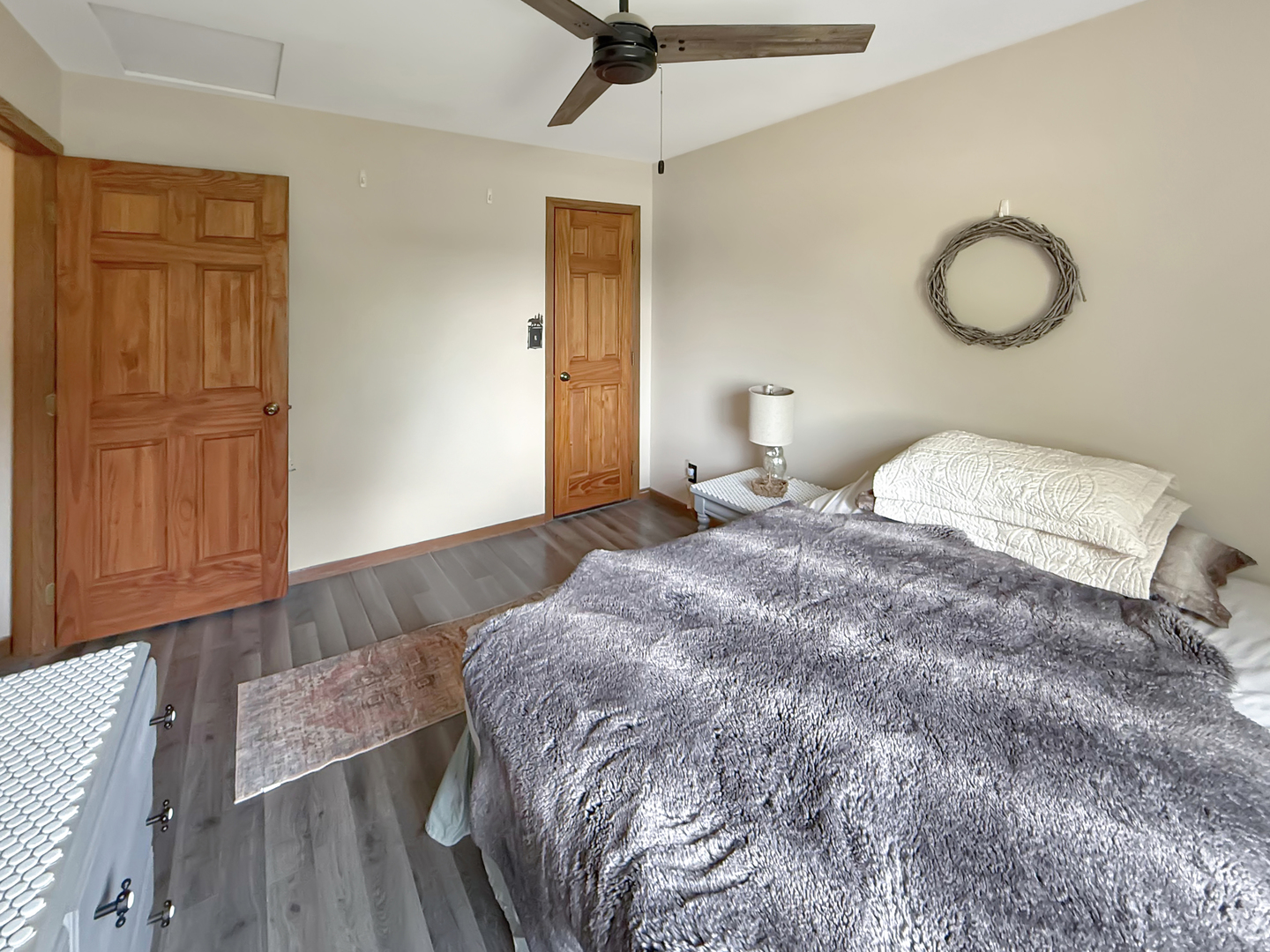 49W972 Peterson Road Maple Park, IL 60151 - Photo 17 of 38 a bedroom with a bed and cabinets