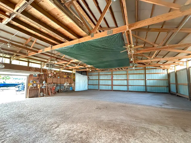 a view of a garage with wooden wall