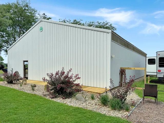 a backyard of a house with lots of green space