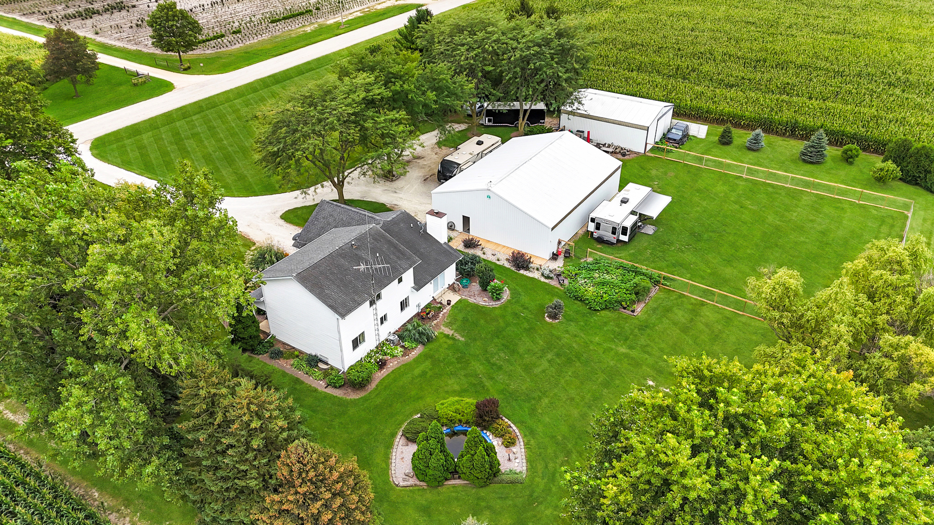 49W972 Peterson Road Maple Park, IL 60151 - Photo 4 of 38 an aerial view of a house with a garden