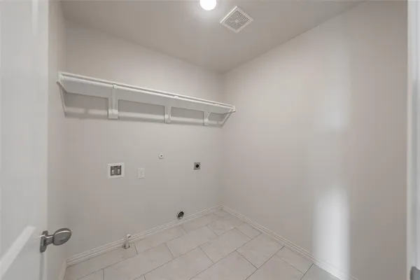 a view of a livingroom with a ceiling fan and window