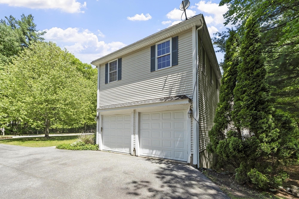 4 Forest Street Georgetown, MA 01833 - Photo 2 of 37 a view of a house with a backyard