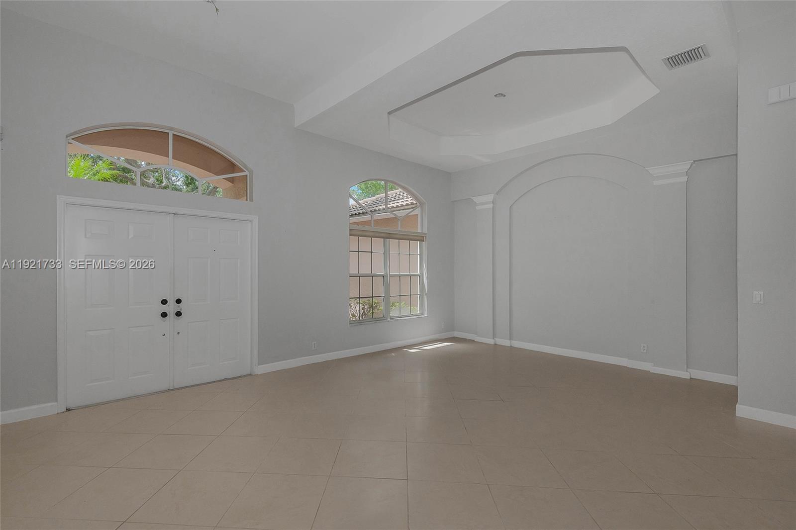 3843 Oak Ridge Circle Weston, FL 33331 - Photo 11 of 39 a view of an empty room with a window
