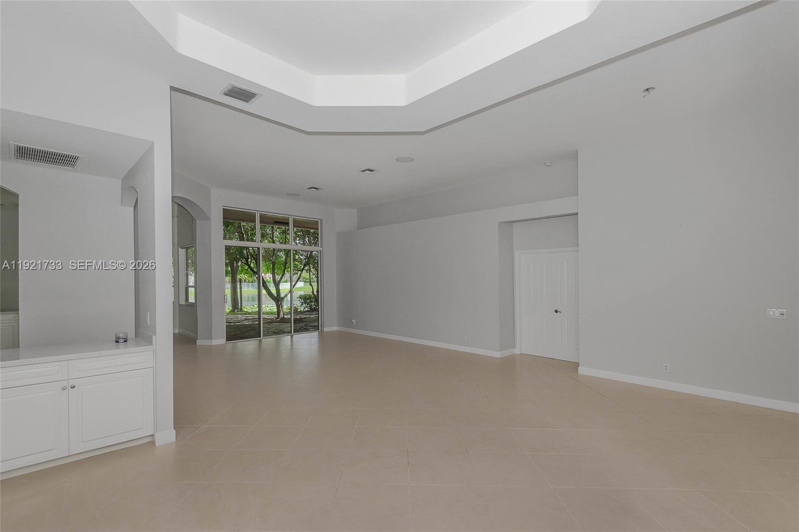 3843 Oak Ridge Circle Weston, FL 33331 - Photo 14 of 39 a view of an empty room with a window