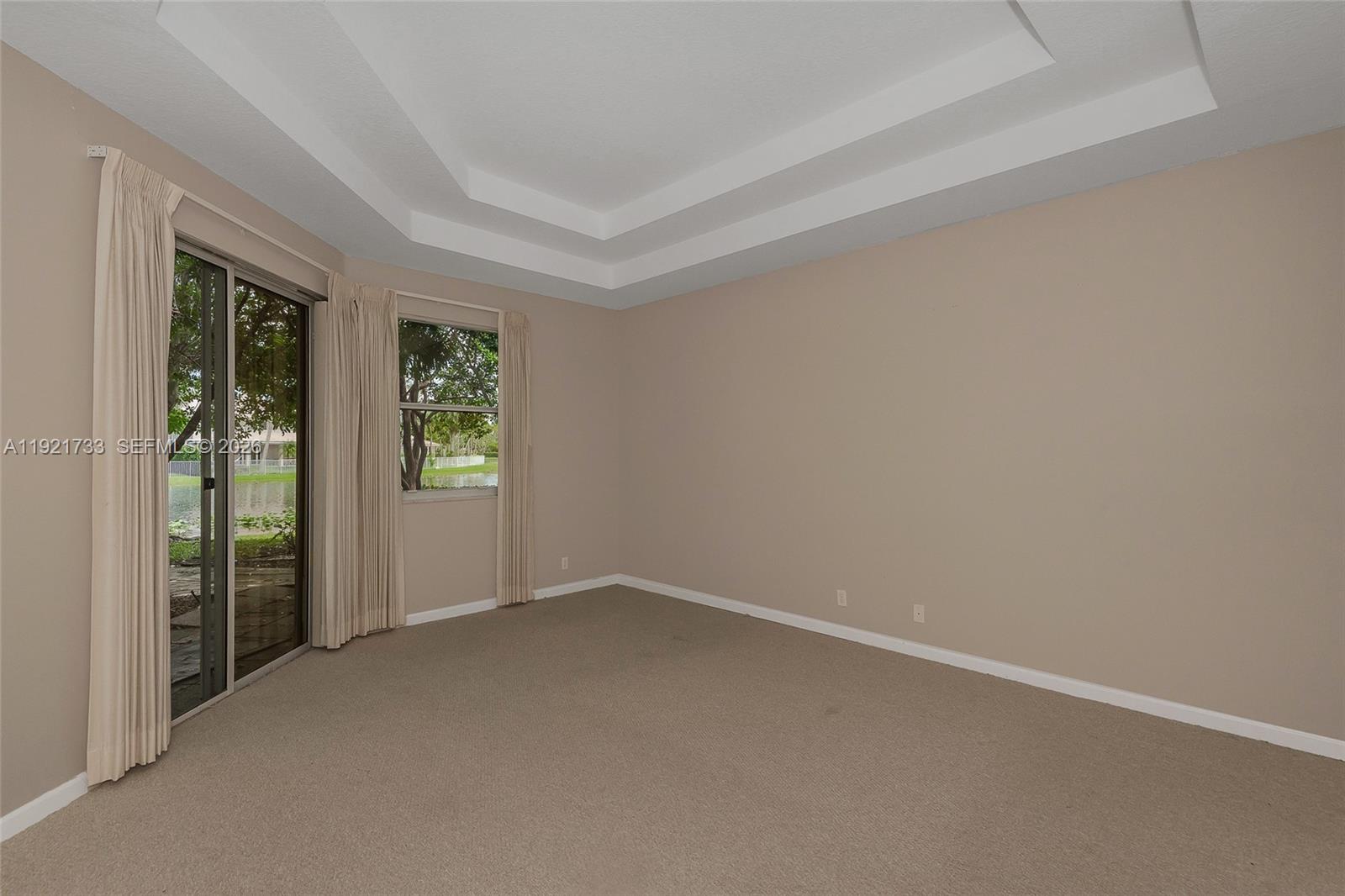 3843 Oak Ridge Circle Weston, FL 33331 - Photo 17 of 39 an empty room with windows