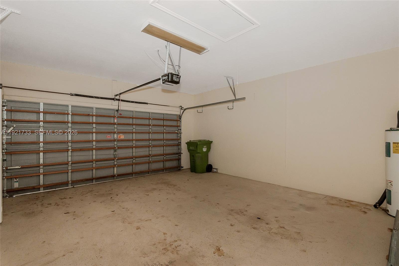 3843 Oak Ridge Circle Weston, FL 33331 - Photo 35 of 39 a view of a garage with storage