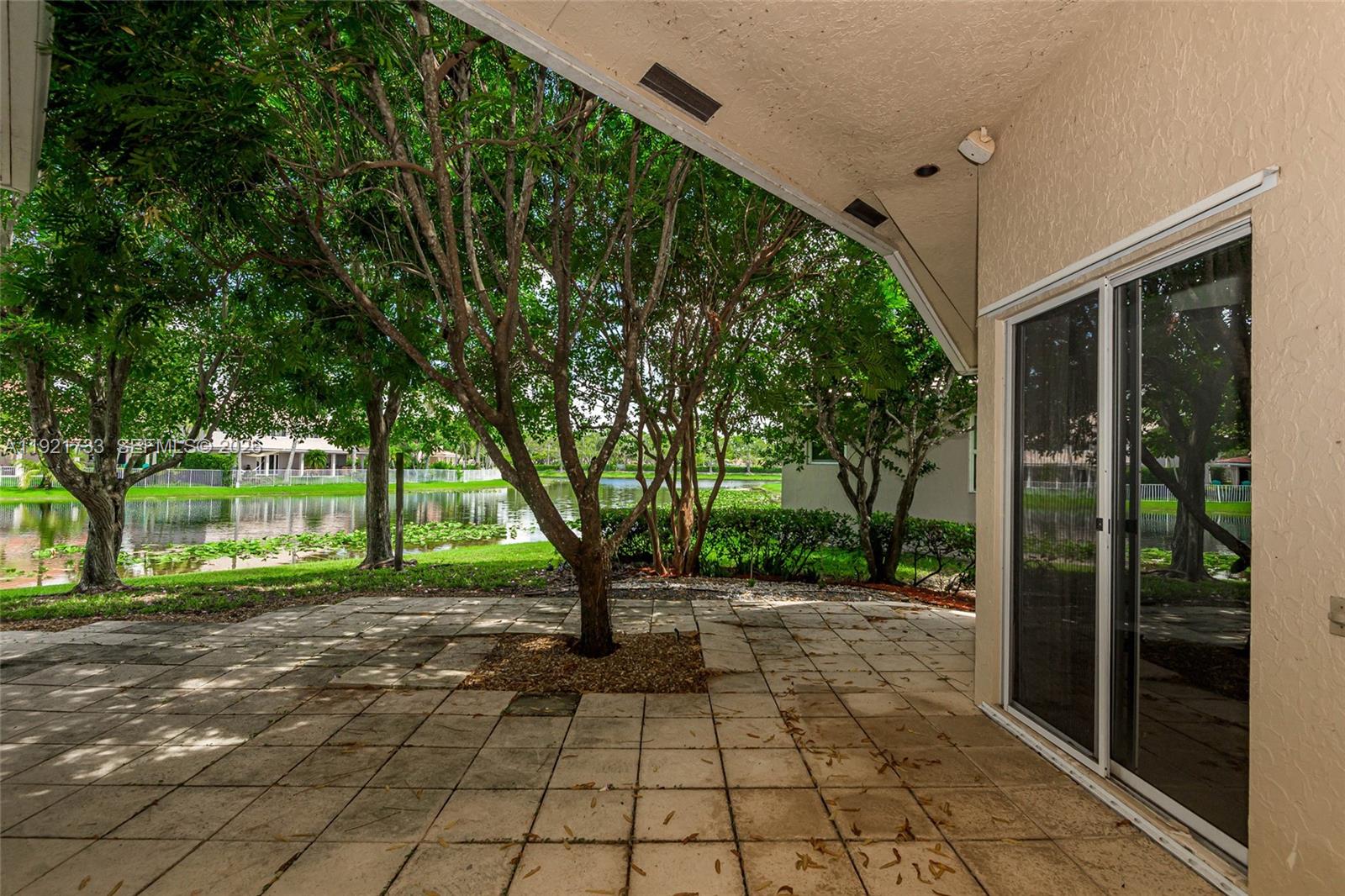 3843 Oak Ridge Circle Weston, FL 33331 - Photo 37 of 39 a view of a garden with pathway