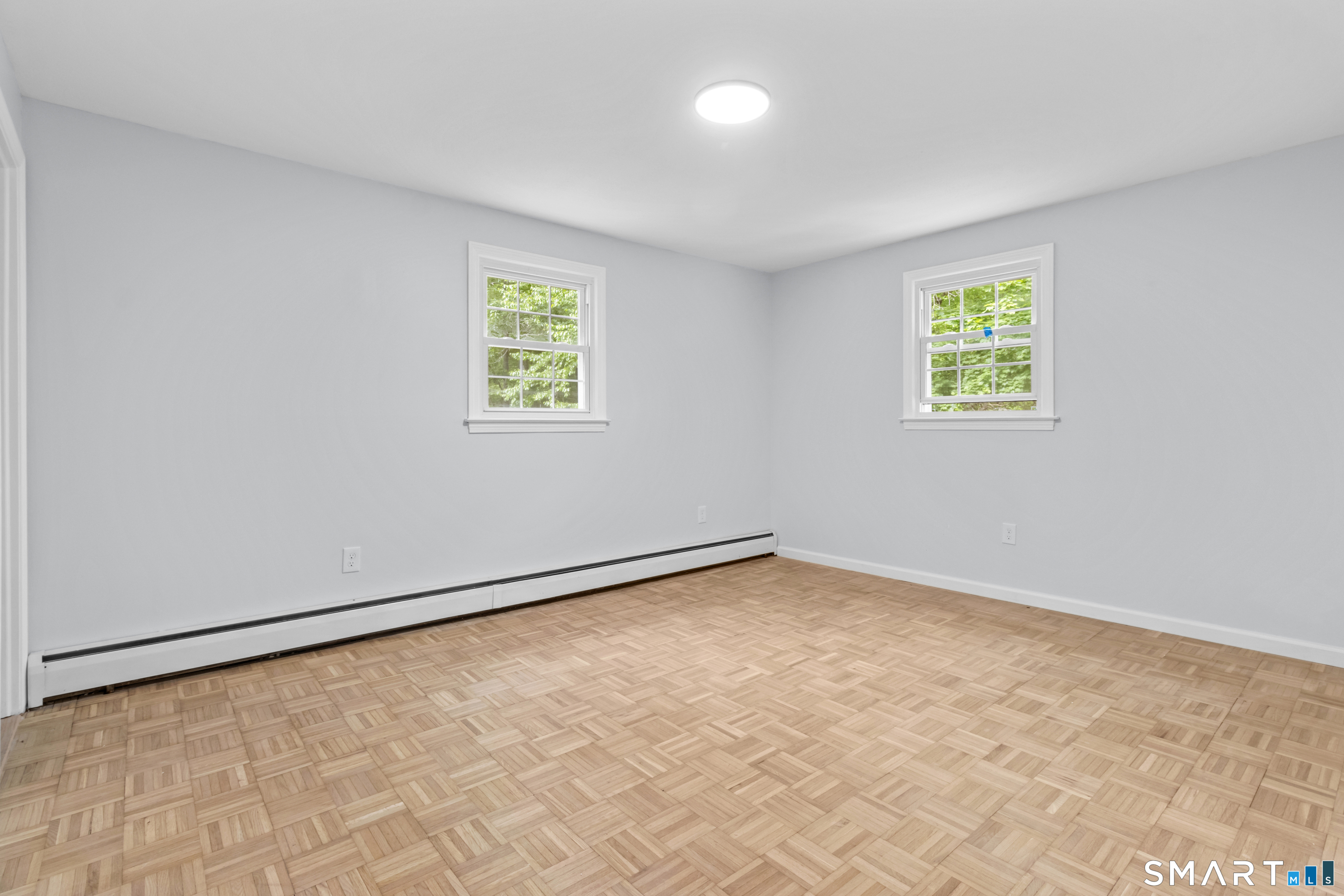 20 Quiet Woods Road East Hampton, CT 06424 - Photo 12 of 40 an empty room with a window