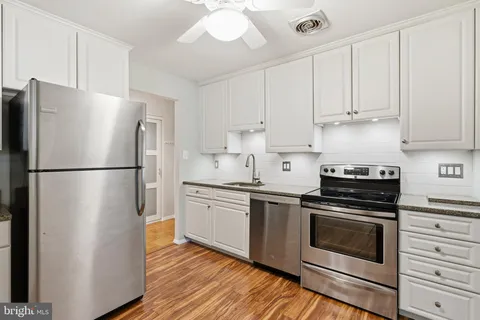 a view of a bathroom from the hallway