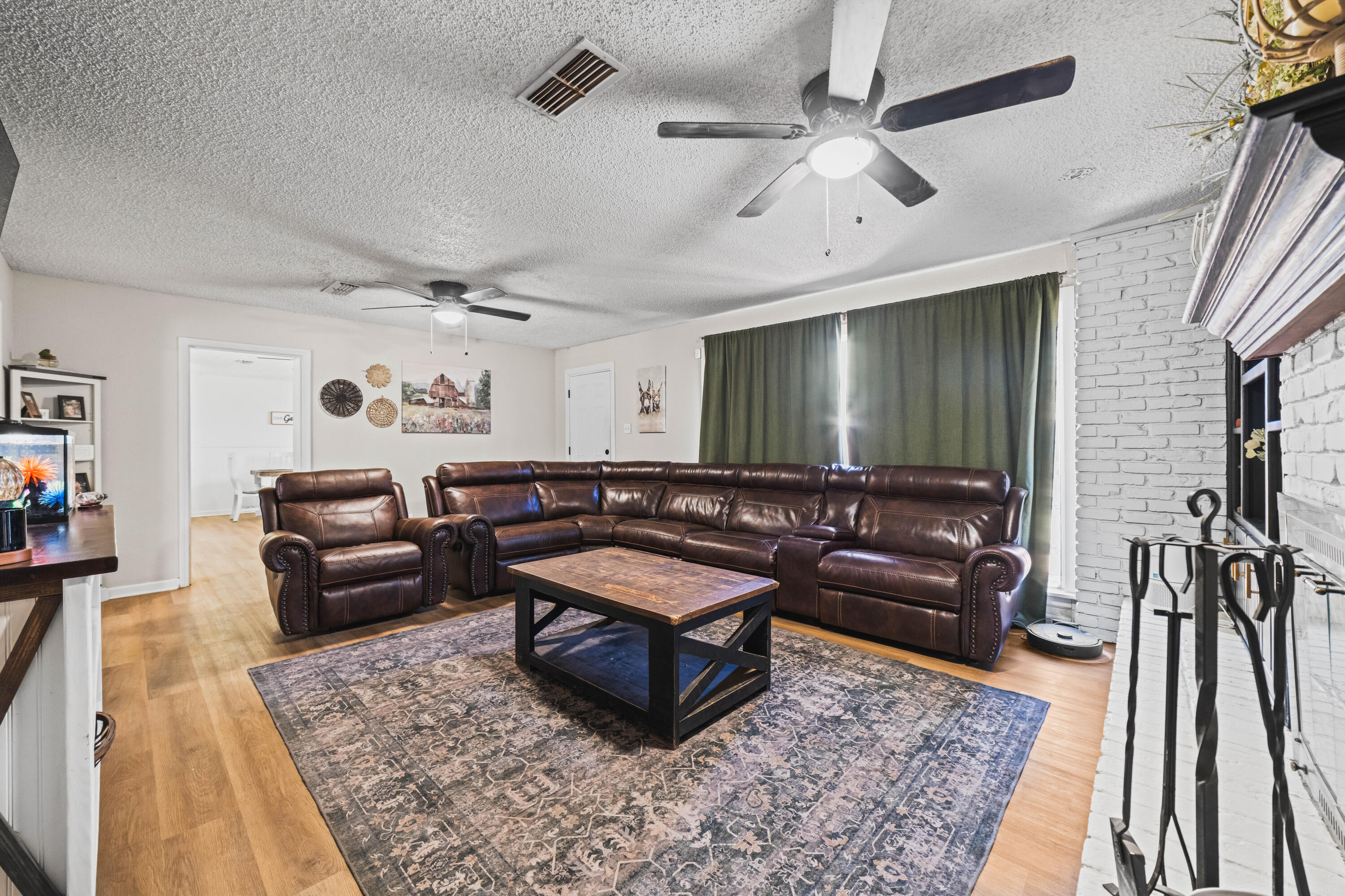 2510 59th Street Lubbock, TX 79413 - Photo 12 of 22 a living room with furniture and a rug