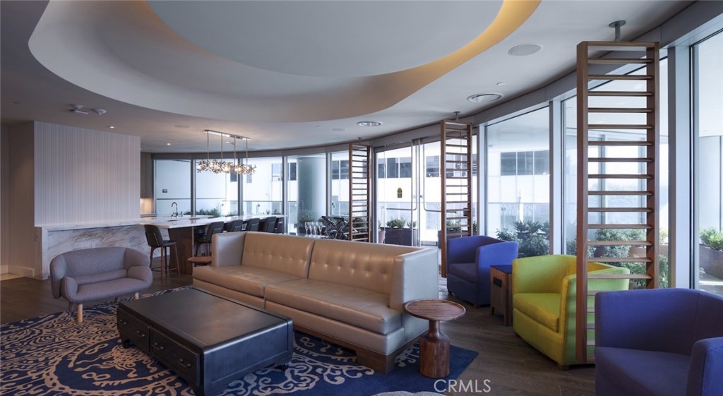 100 Van Ness Avenue, Unit 603 San Francisco, CA 94102 - Photo 17 of 75 a living room with furniture and a large window