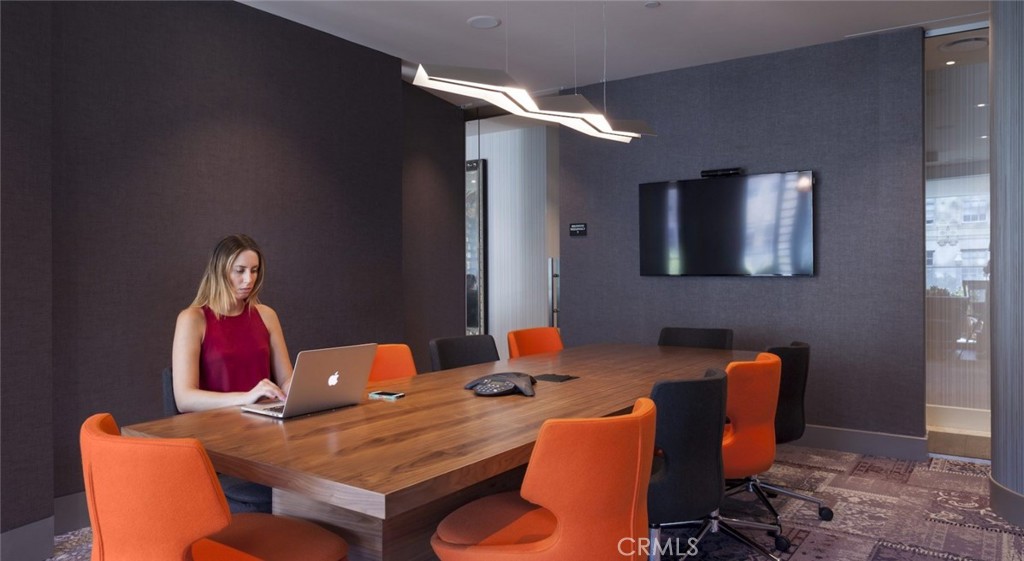 100 Van Ness Avenue, Unit 603 San Francisco, CA 94102 - Photo 21 of 75 a dining room with furniture and wooden floor