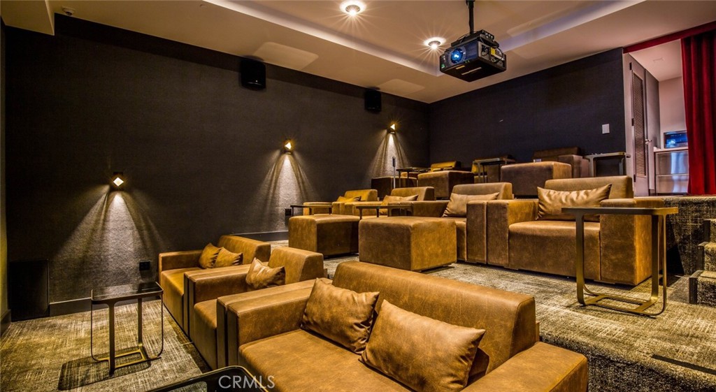 100 Van Ness Avenue, Unit 603 San Francisco, CA 94102 - Photo 39 of 75 a media room with lots of chairs and mirrors