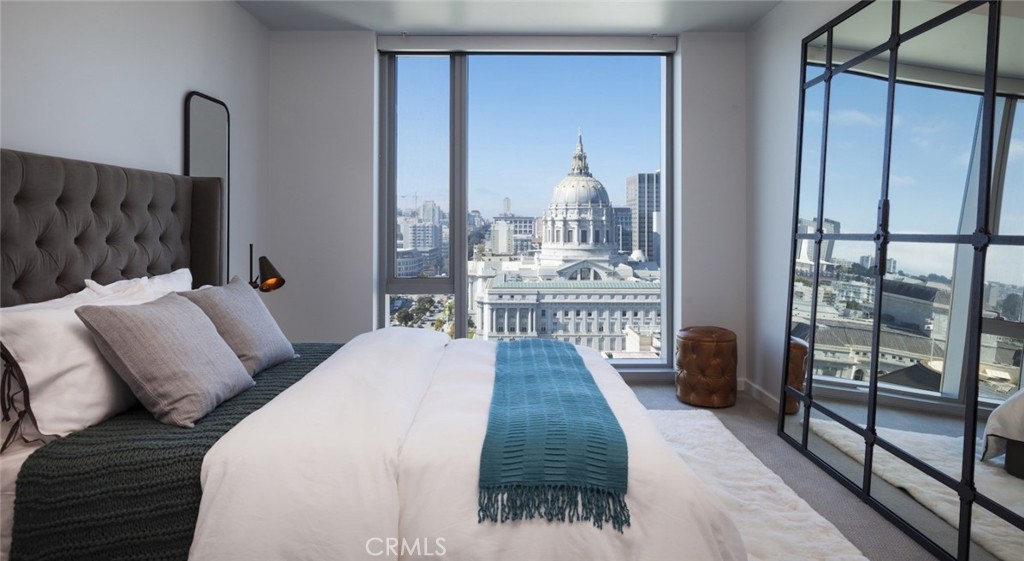 100 Van Ness Avenue, Unit 603 San Francisco, CA 94102 - Photo 6 of 75 a bedroom with a bed and a window