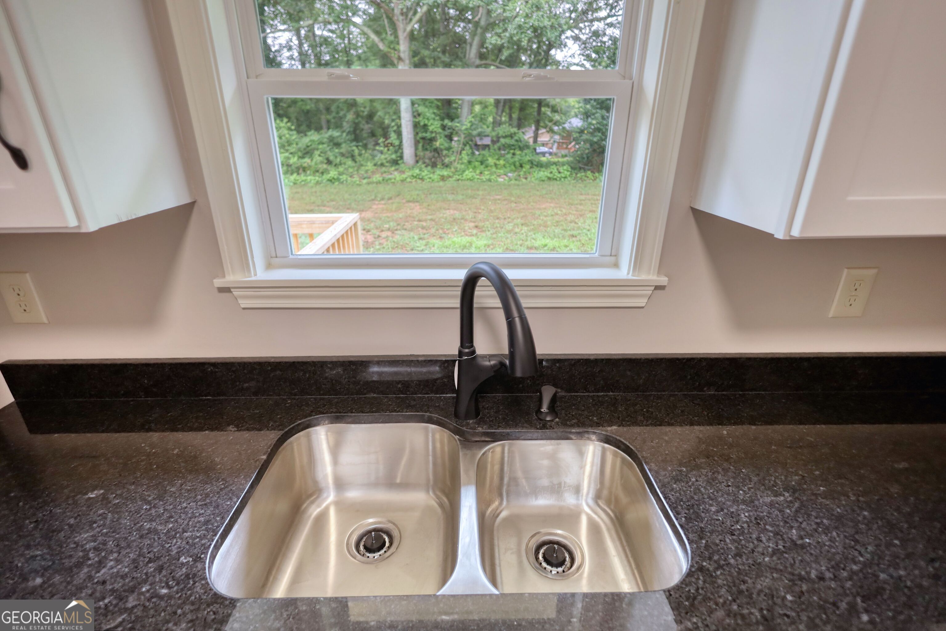 855 Meadow Ridge Drive Madison, GA 30650 - Photo 13 of 41 a close view of sink and window