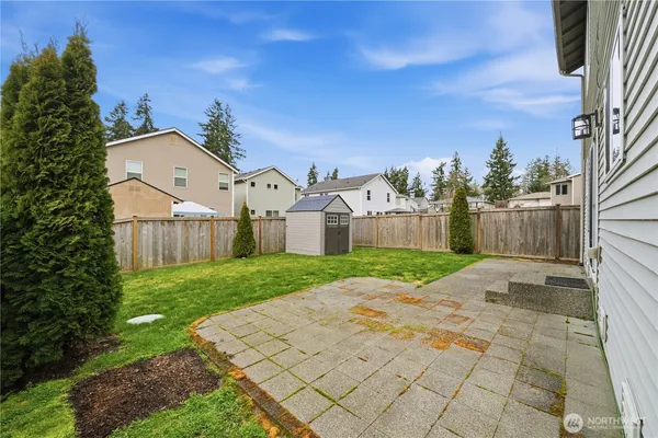 a view of a back yard of the house
