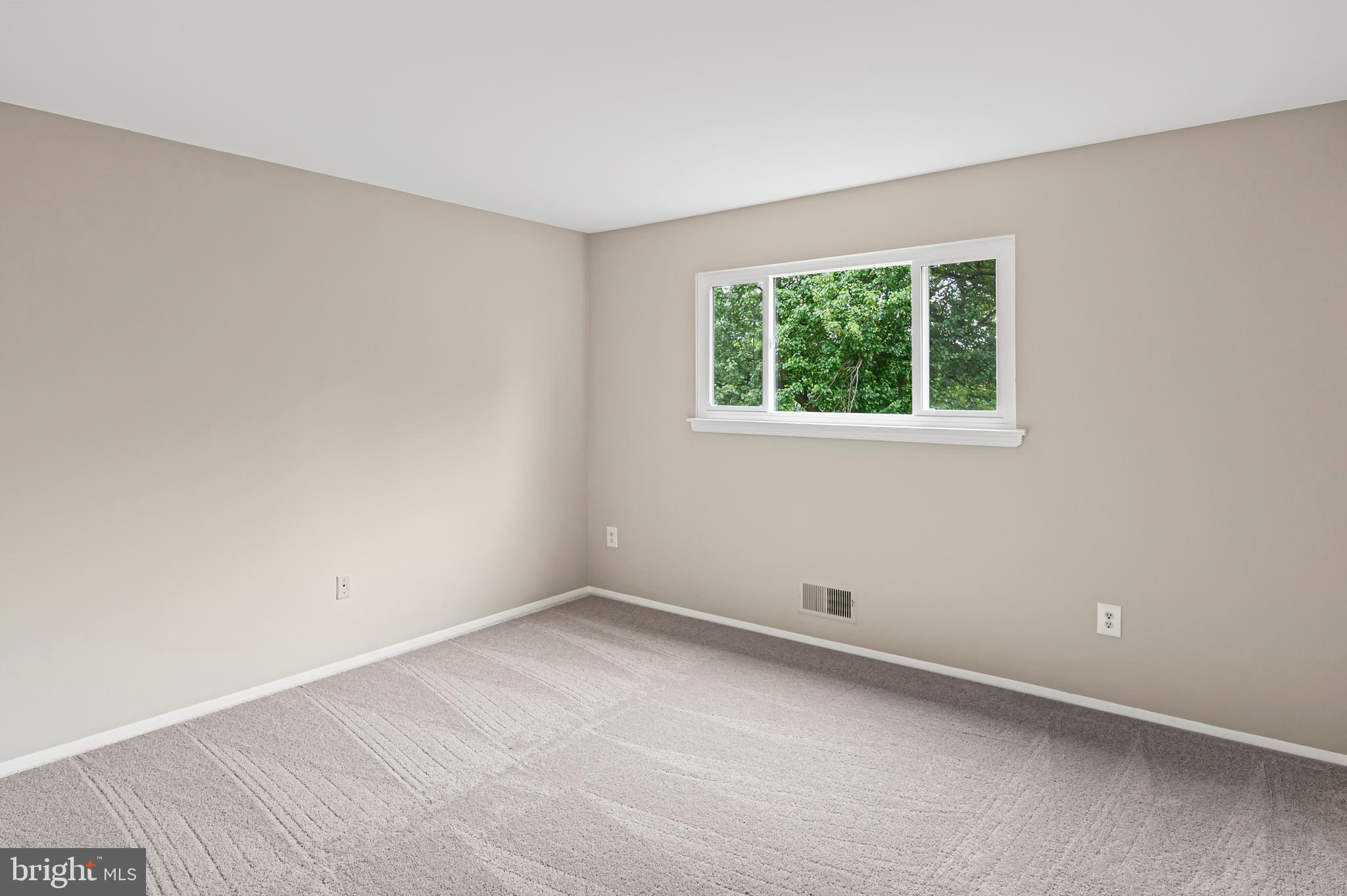 6411 Darwin Road Laurel, MD 20707 - Photo 14 of 41 an empty room with a window