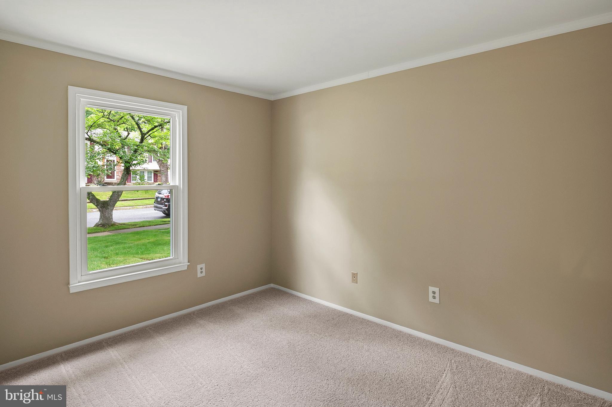 6411 Darwin Road Laurel, MD 20707 - Photo 20 of 41 an empty room with windows