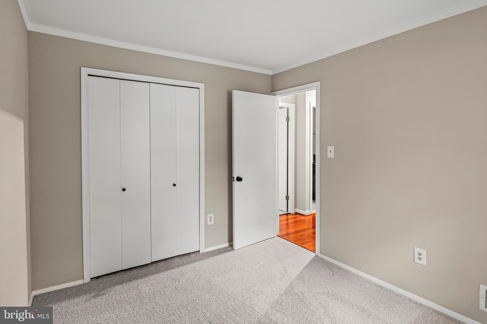 6411 Darwin Road Laurel, MD 20707 - Photo 21 of 41 a room that has a glass door