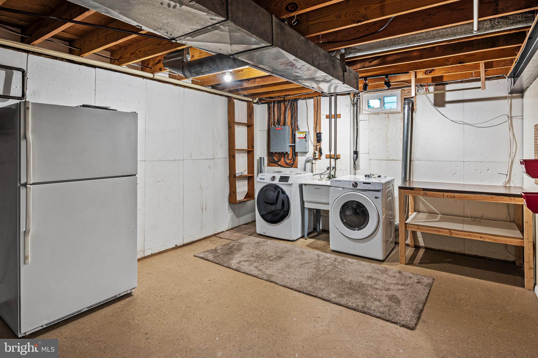 6411 Darwin Road Laurel, MD 20707 - Photo 28 of 41 a utility room with dryer and washer