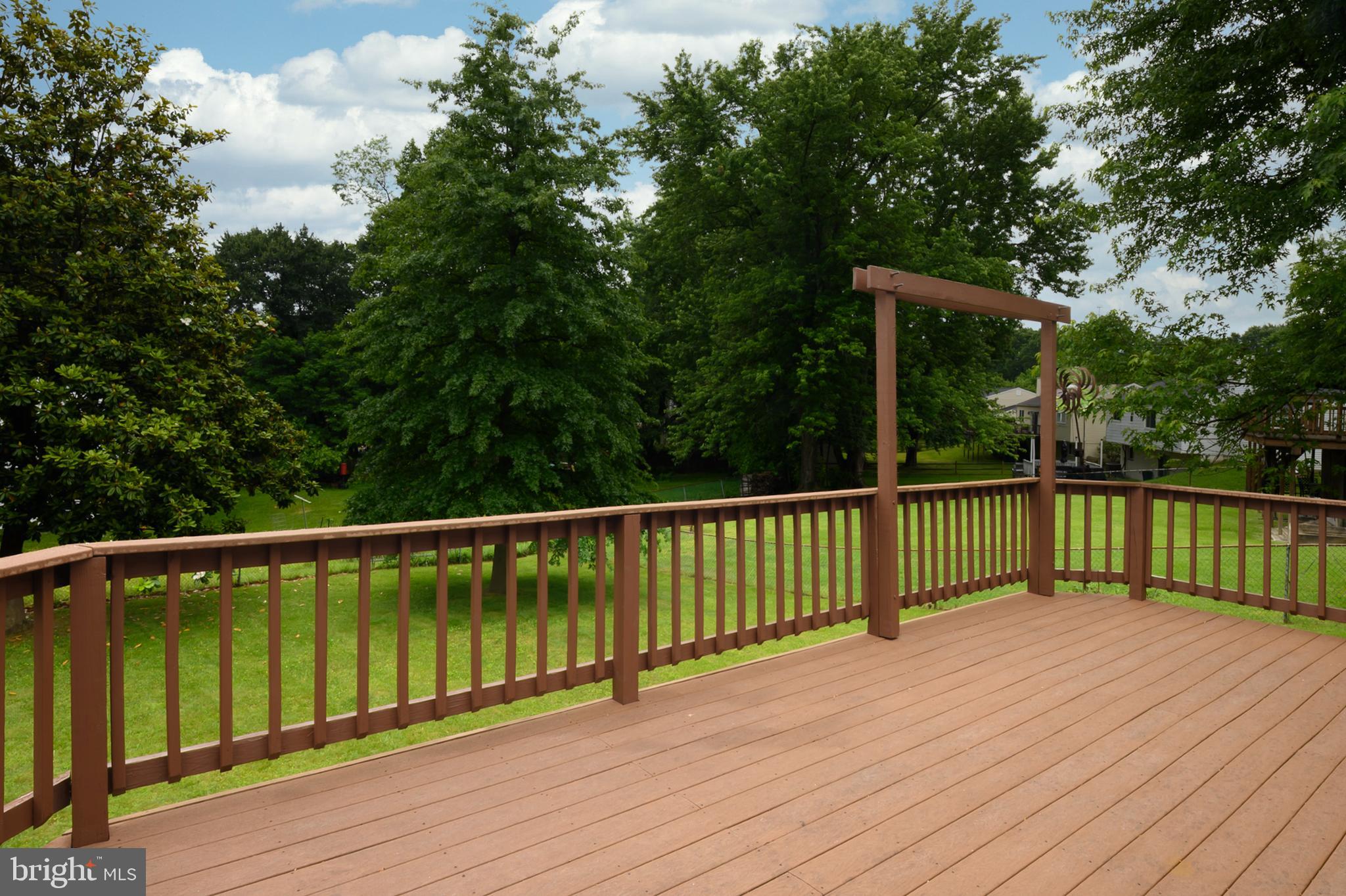 6411 Darwin Road Laurel, MD 20707 - Photo 32 of 41 a view of balcony with wooden floor