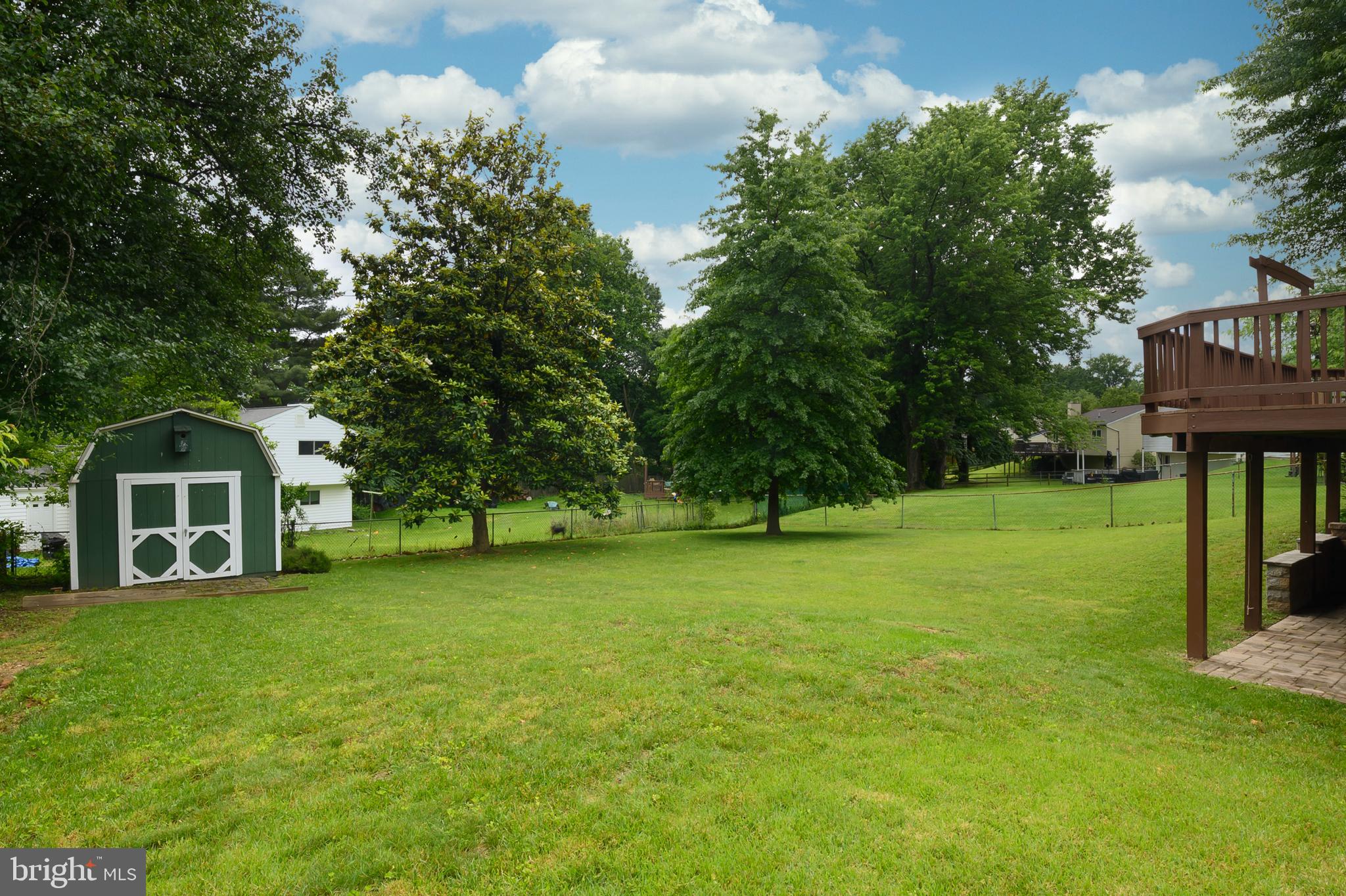 6411 Darwin Road Laurel, MD 20707 - Photo 34 of 41 a view of a house with a yard