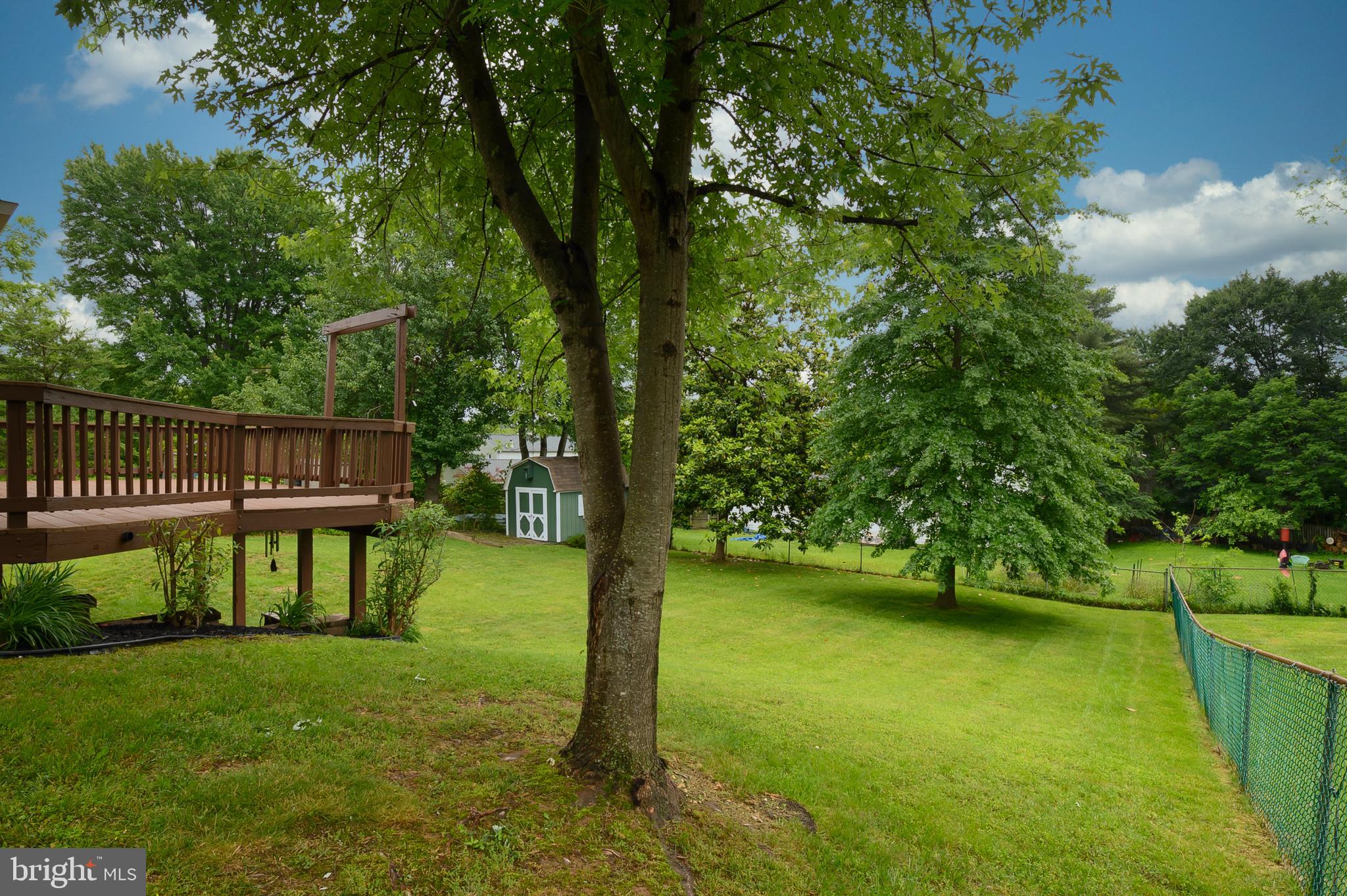 6411 Darwin Road Laurel, MD 20707 - Photo 36 of 41 a view of a house with a yard