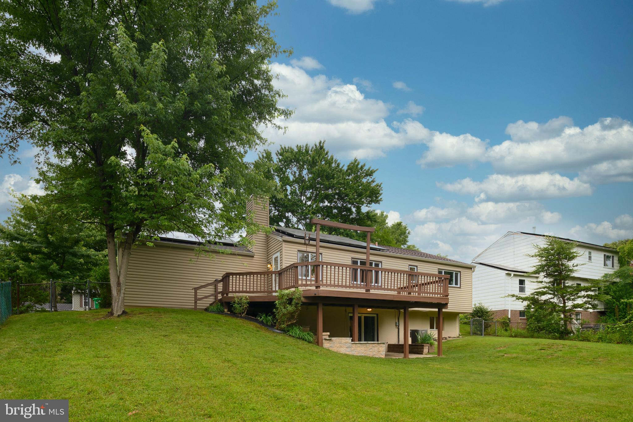 6411 Darwin Road Laurel, MD 20707 - Photo 38 of 41 a view of a house with a yard balcony and sitting area