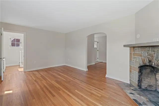 a view of livingroom with hardwood floor and hallway