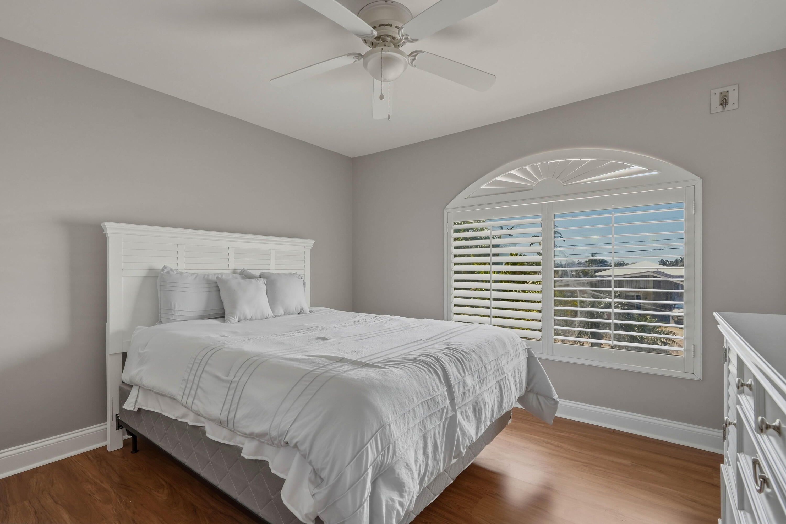 320 5th Street Key Colony Beach, FL 33051 - Photo 26 of 53 a bedroom with a bed and window