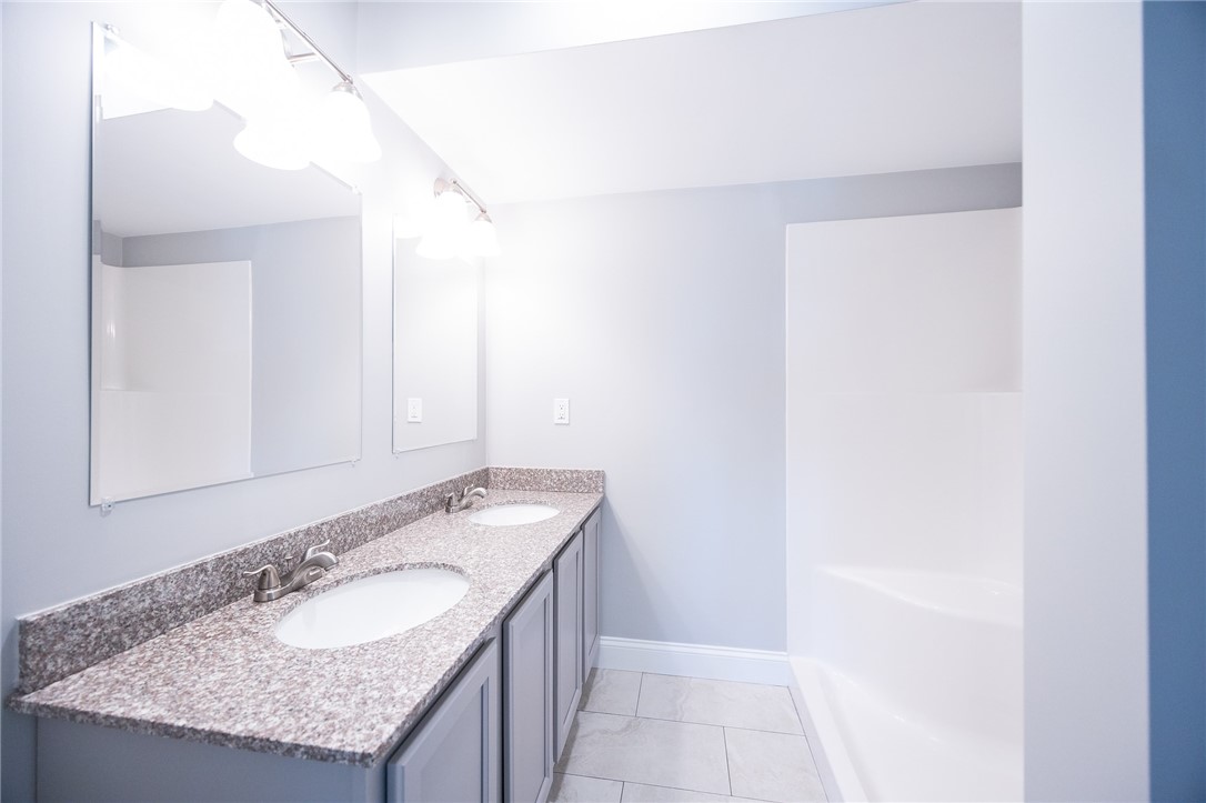 9 Gray Coach Lane, Unit 905 Cranston, RI 02921 - Photo 10 of 19 Master bath with walk-in shower & double vanity
