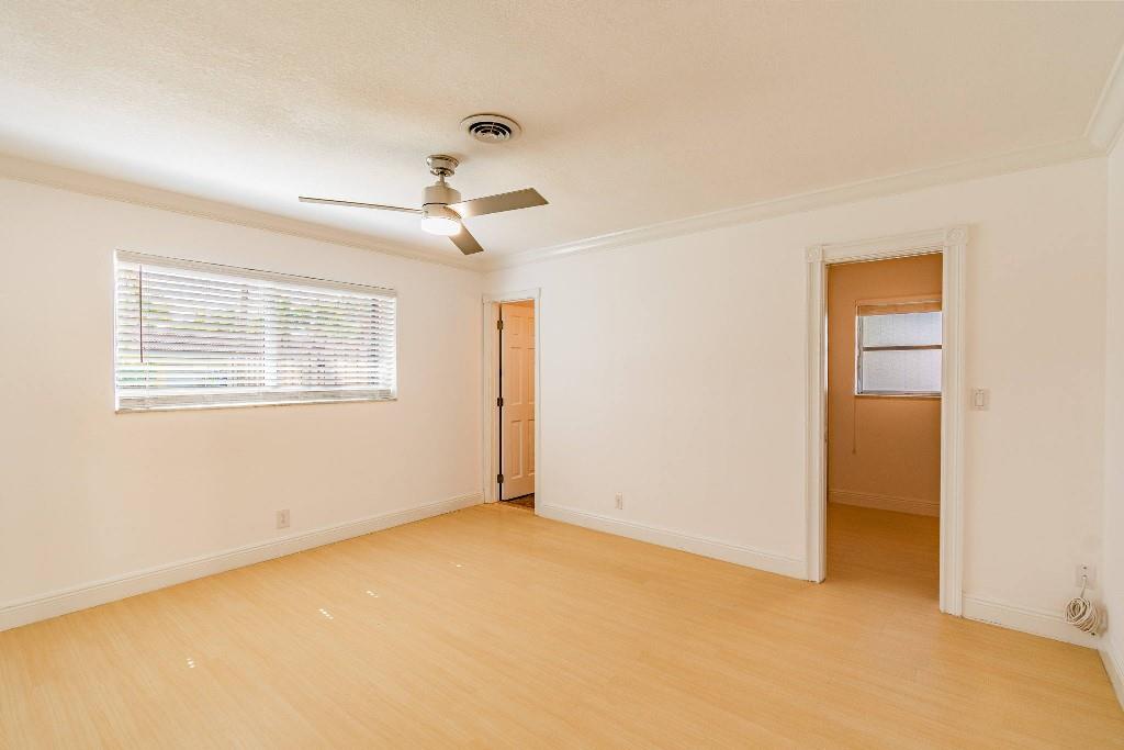 2650 Northeast 52nd Street Lighthouse Point, FL 33064 - Photo 17 of 35 a view of an empty room with a window