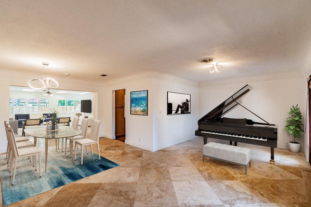 2650 Northeast 52nd Street Lighthouse Point, FL 33064 - Photo 2 of 35 a living room with furniture and a piano