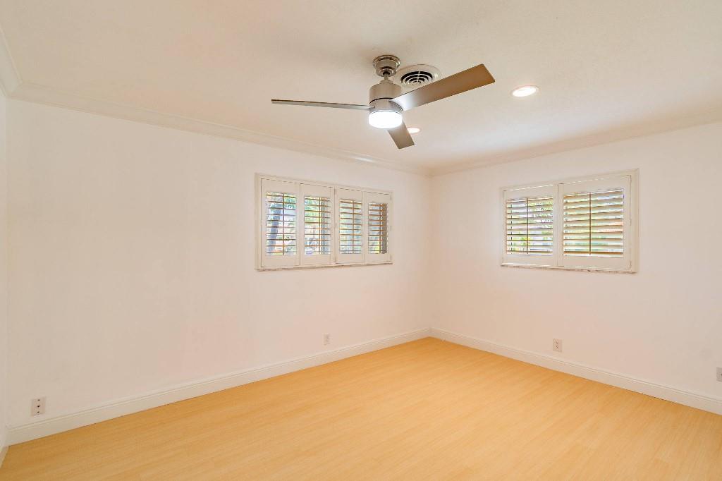 2650 Northeast 52nd Street Lighthouse Point, FL 33064 - Photo 22 of 35 a view of an empty room with a window