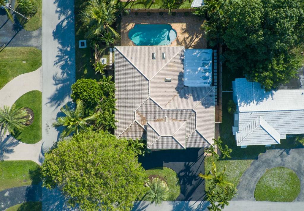 2650 Northeast 52nd Street Lighthouse Point, FL 33064 - Photo 32 of 35 an aerial view of a house with a yard