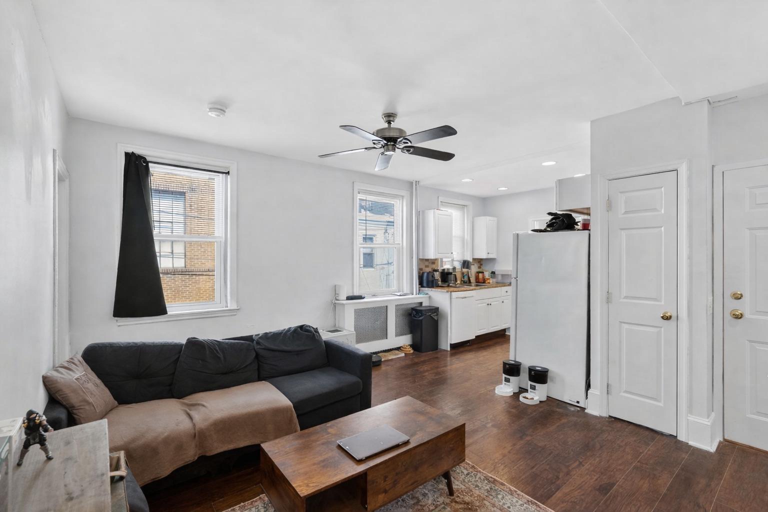 1229 South 6th Street Philadelphia, PA 19147 - Photo 14 of 36 a living room with furniture and a window