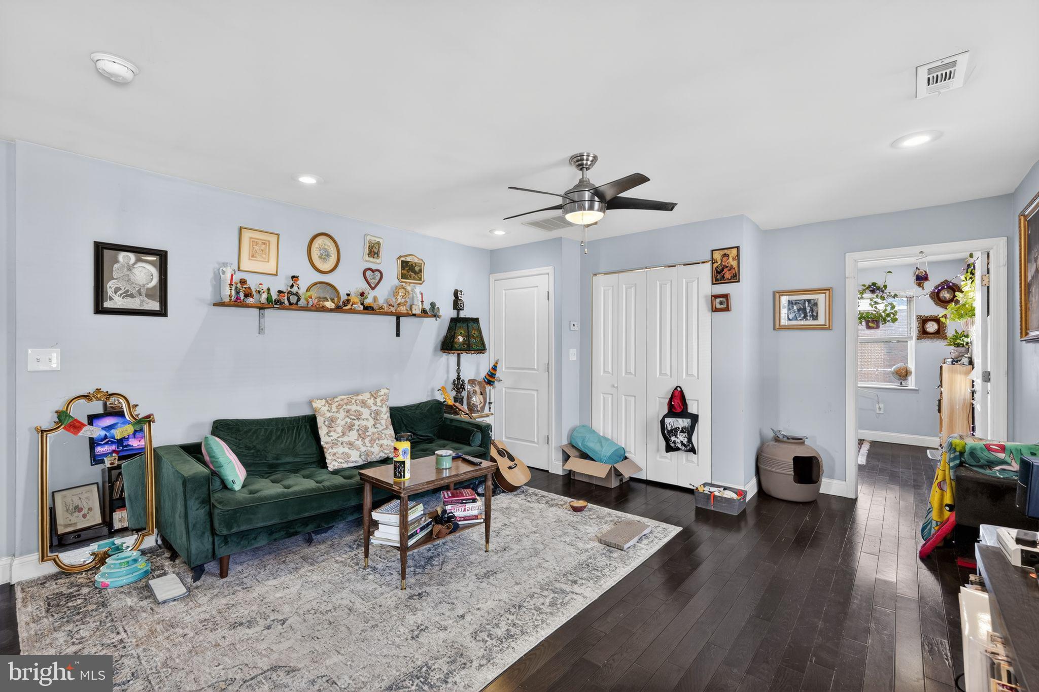 1229 South 6th Street Philadelphia, PA 19147 - Photo 25 of 36 a living room with furniture and wooden floor