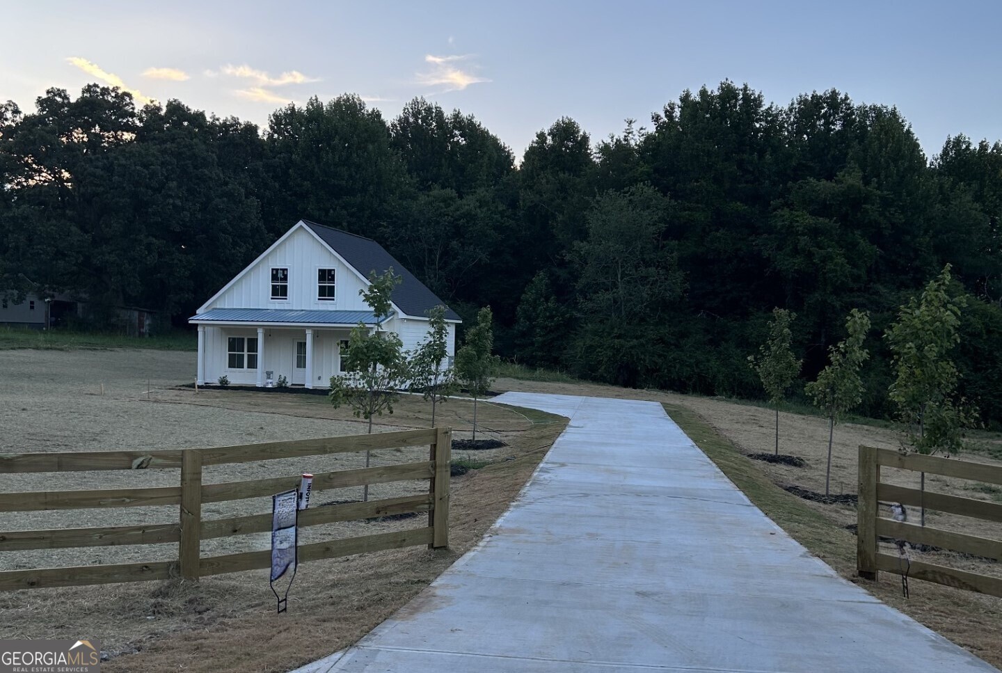 2148 Airport Road Cleveland, GA 30528 - Photo 1 of 1 a front view of a house with a yard
