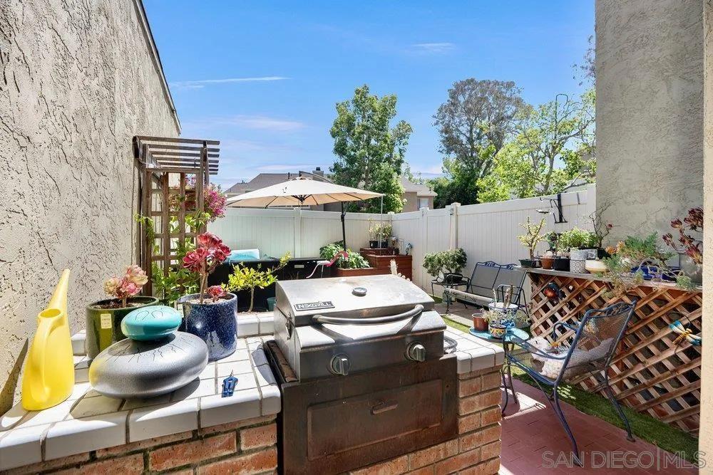 13358 Birch Tree Lane Poway, CA 92064 - Photo 8 of 16 a view of a chairs and tables in the patio and a fire pit