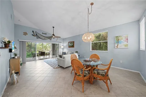 a kitchen with stainless steel appliances granite countertop a refrigerator sink and stove