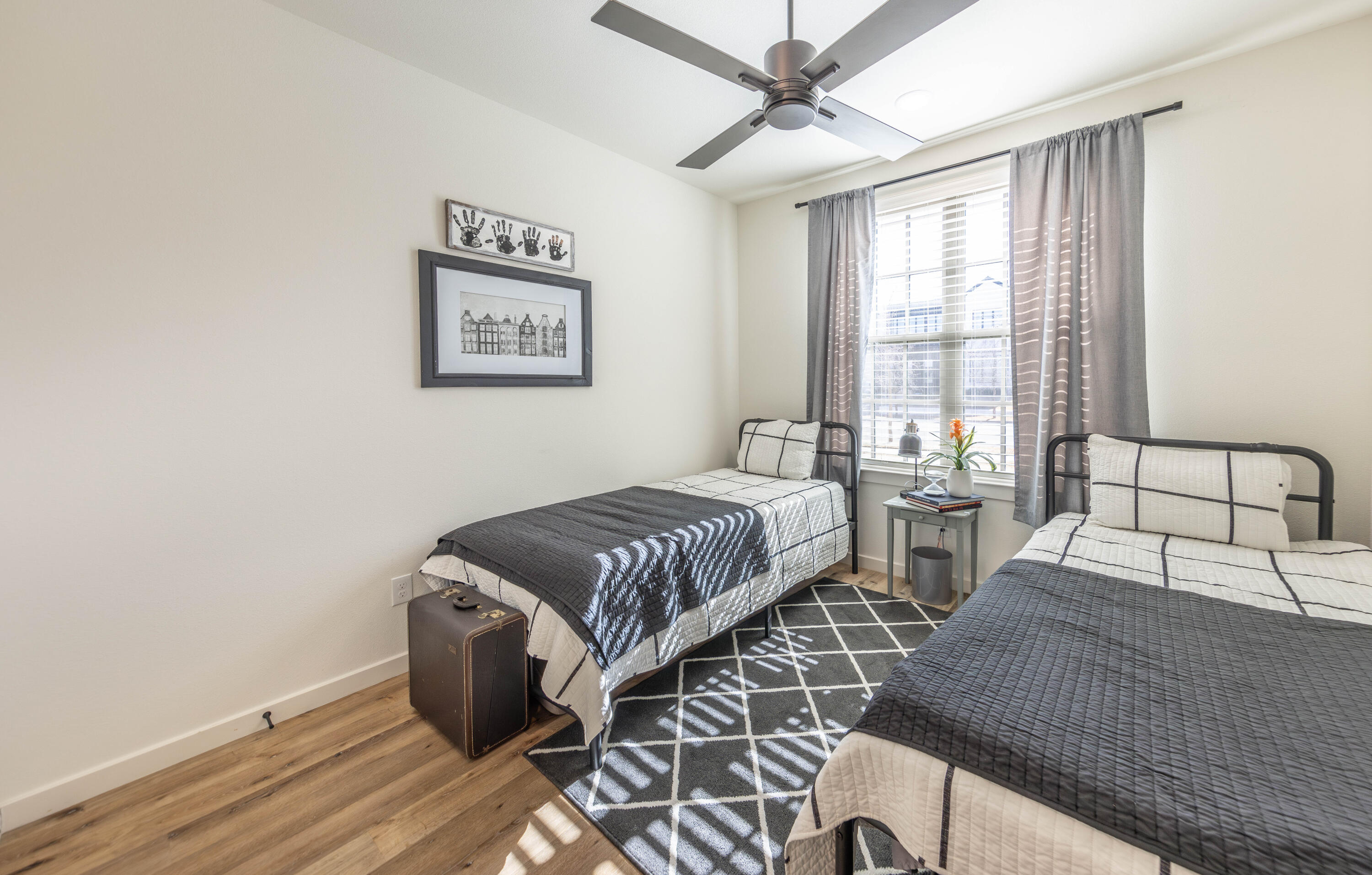 3816 128th Street Lubbock, TX 79423 - Photo 20 of 47 a bedroom with a large bed and a window