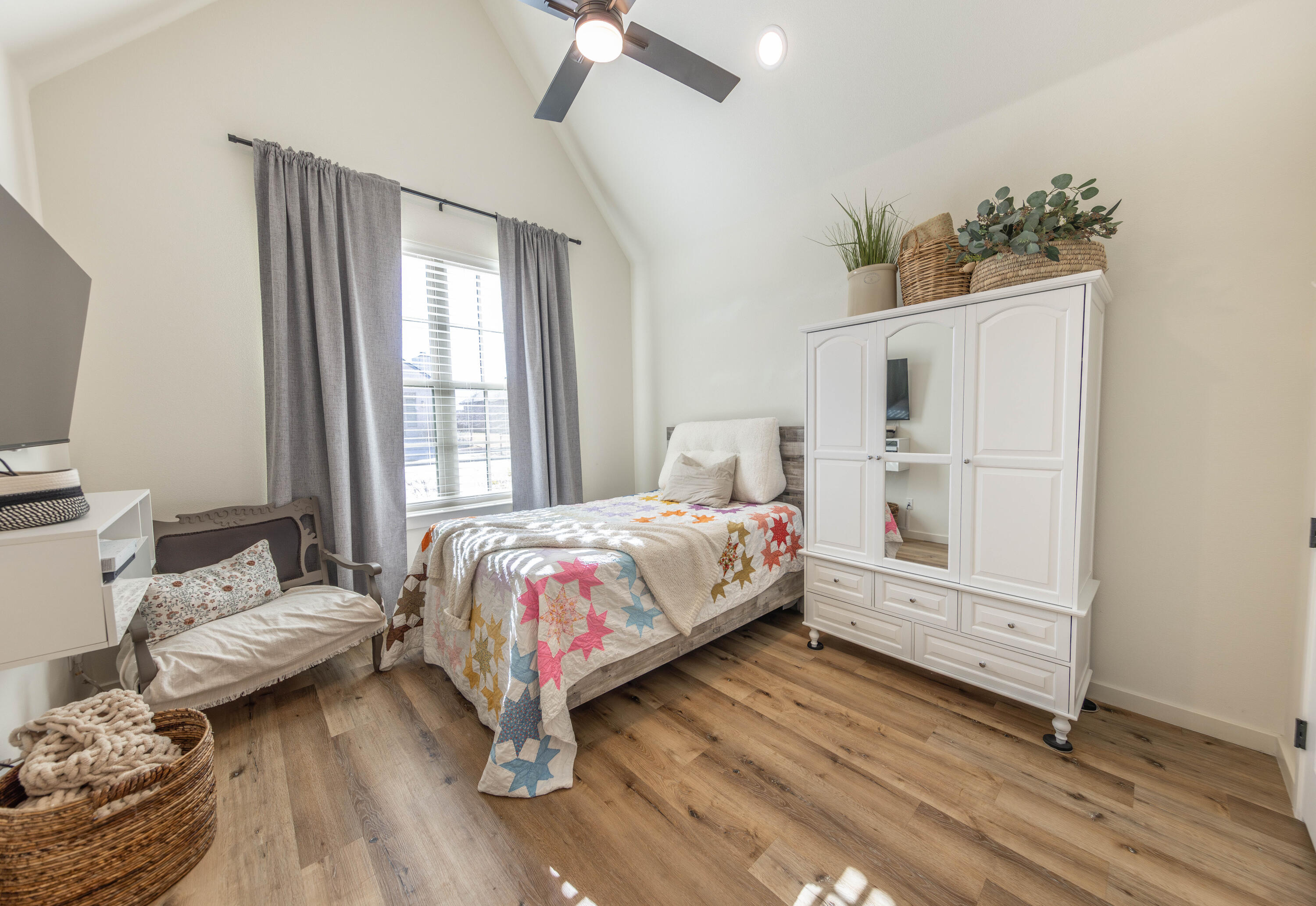 3816 128th Street Lubbock, TX 79423 - Photo 23 of 47 a bedroom with a bed and a window