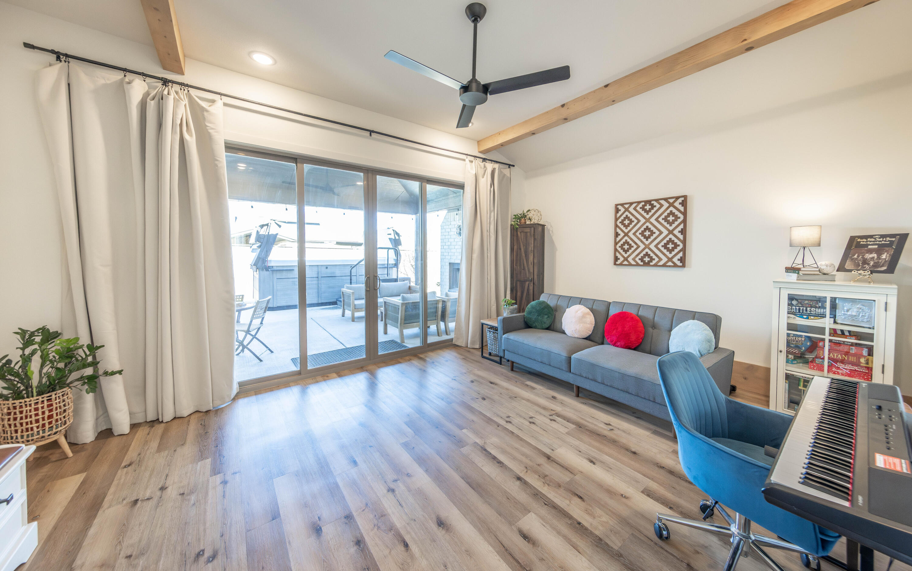3816 128th Street Lubbock, TX 79423 - Photo 29 of 47 a living room with furniture and a wooden floor