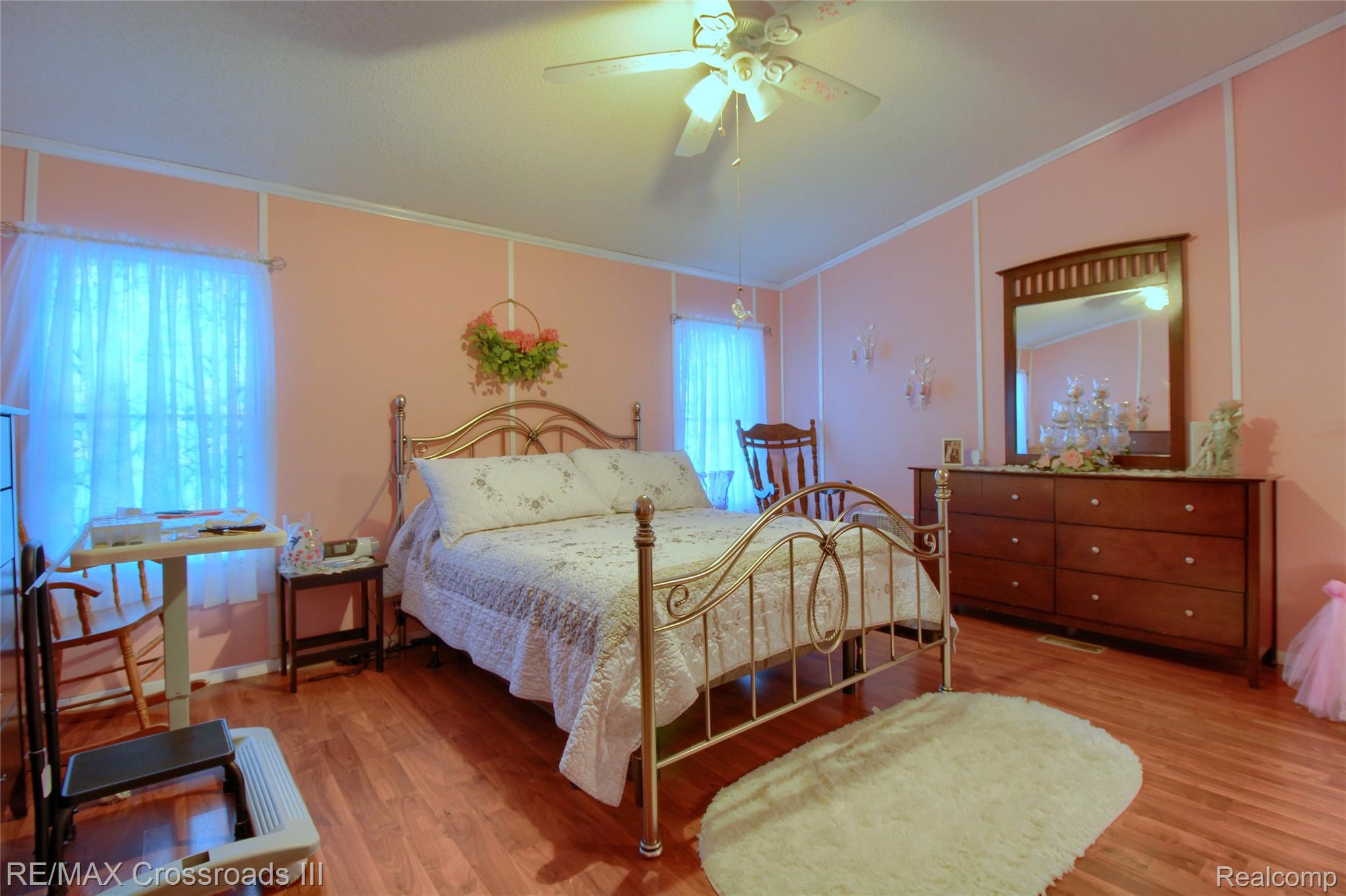 48620 Wear Road Belleville, MI 48111 - Photo 14 of 24 Bedroom with light wood-type flooring, ceiling fan, lofted ceiling, and crown molding