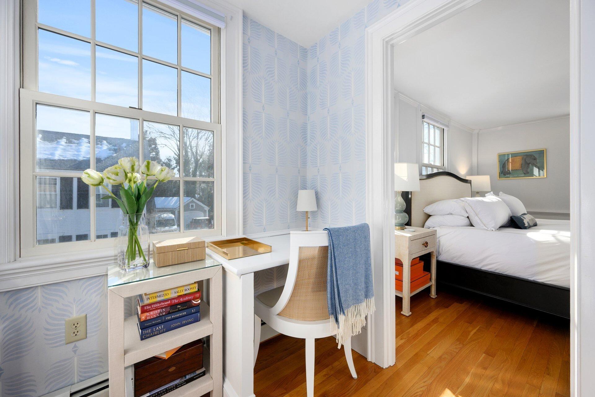 25 Main Street, Unit 3 Marion Center, MA 02738 - Photo 20 of 32 a bedroom with a bed and a table