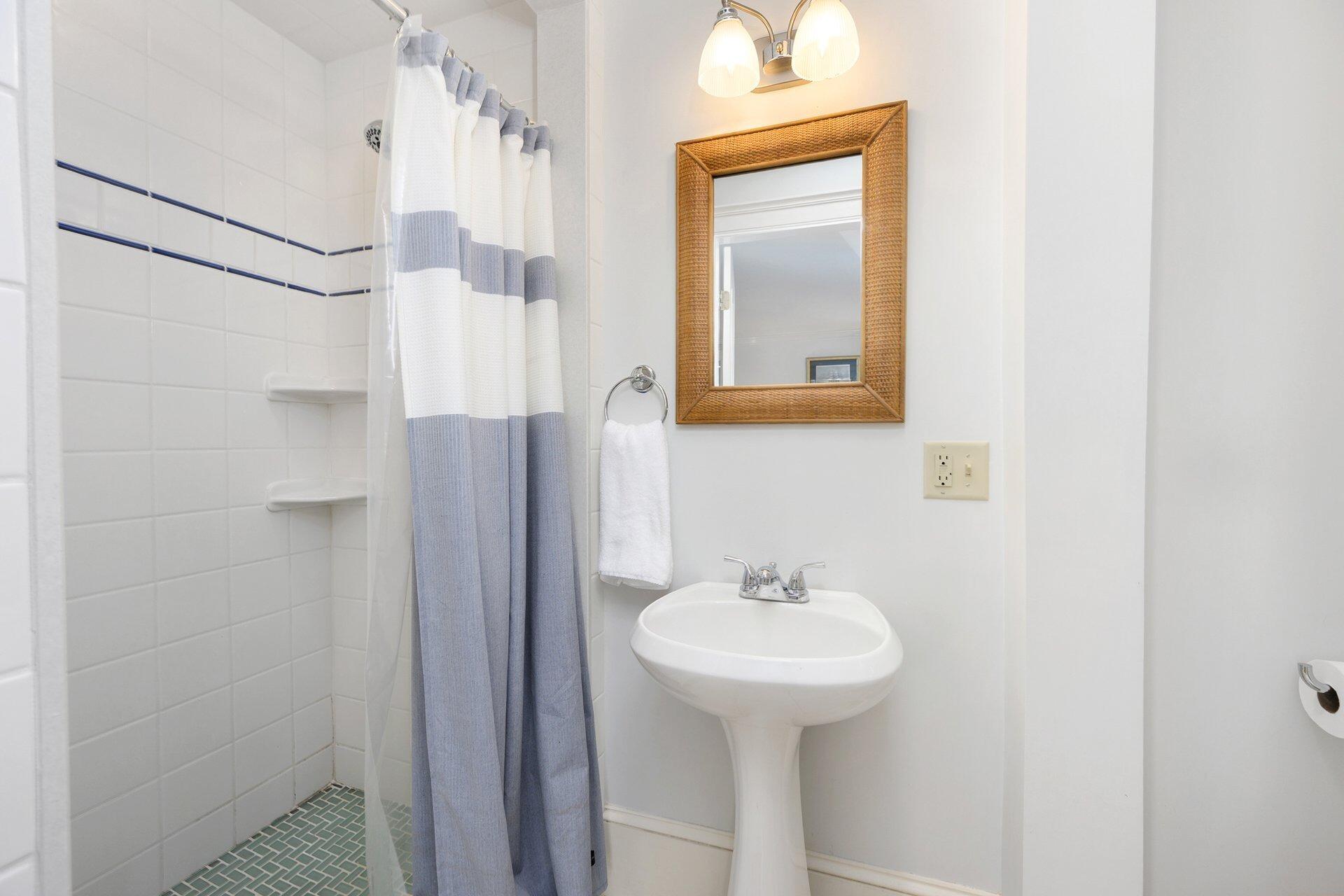 25 Main Street, Unit 3 Marion Center, MA 02738 - Photo 27 of 32 a bathroom with a sink toilet and shower