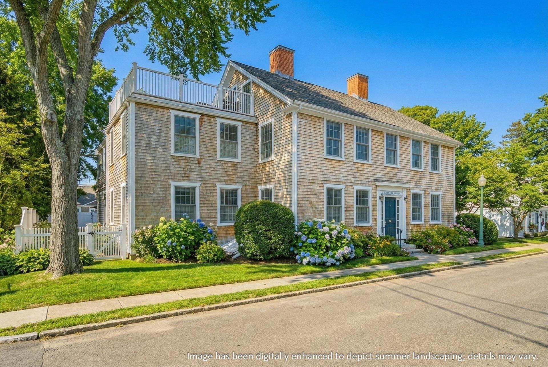 25 Main Street, Unit 3 Marion Center, MA 02738 - Photo 28 of 32 a front view of house with yard and green space