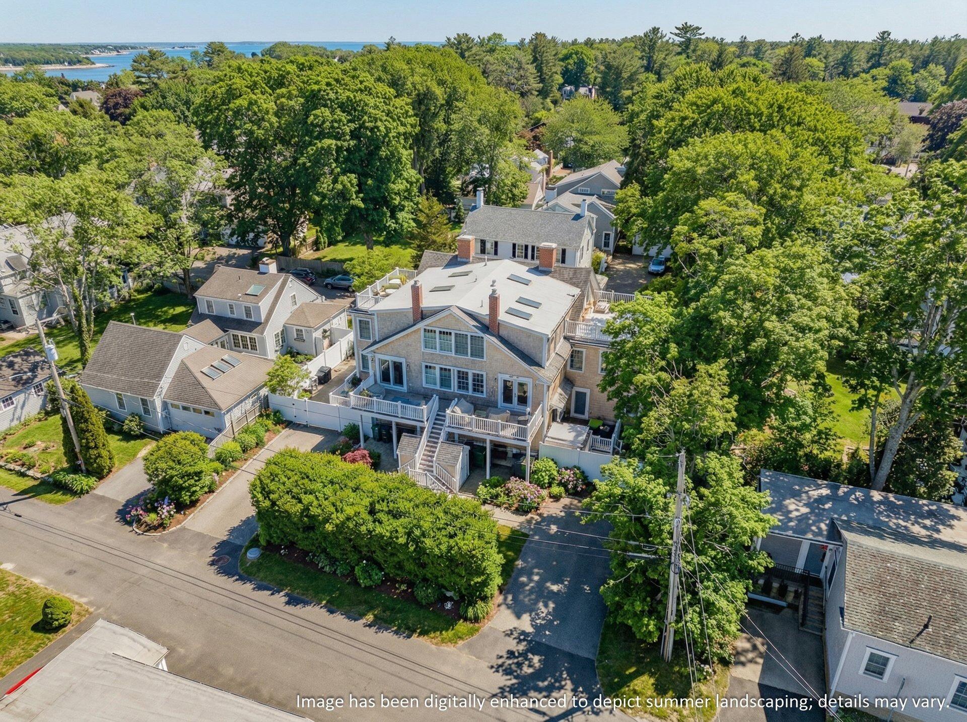 25 Main Street, Unit 3 Marion Center, MA 02738 - Photo 30 of 32 an aerial view of a house with a garden