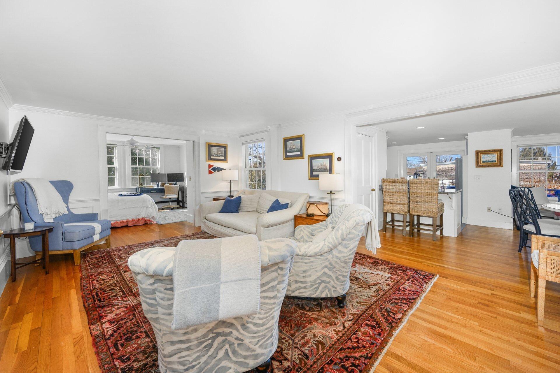 25 Main Street, Unit 3 Marion Center, MA 02738 - Photo 5 of 32 a living room with furniture and wooden floor