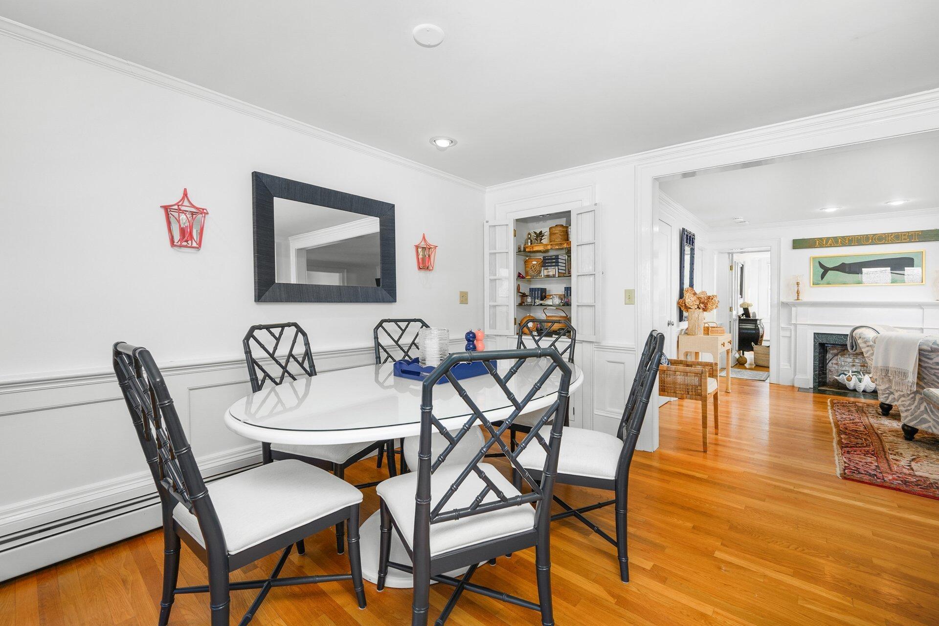 25 Main Street, Unit 3 Marion Center, MA 02738 - Photo 7 of 32 a view of a dining room with furniture and wooden floor